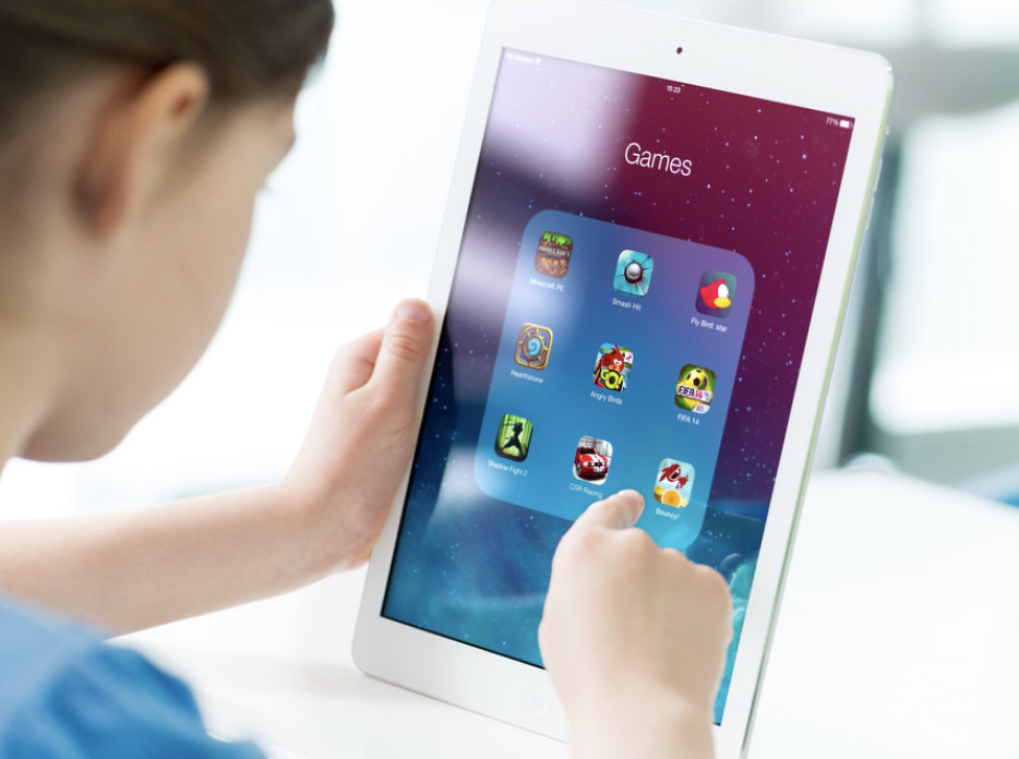 Student playing games on an ipad